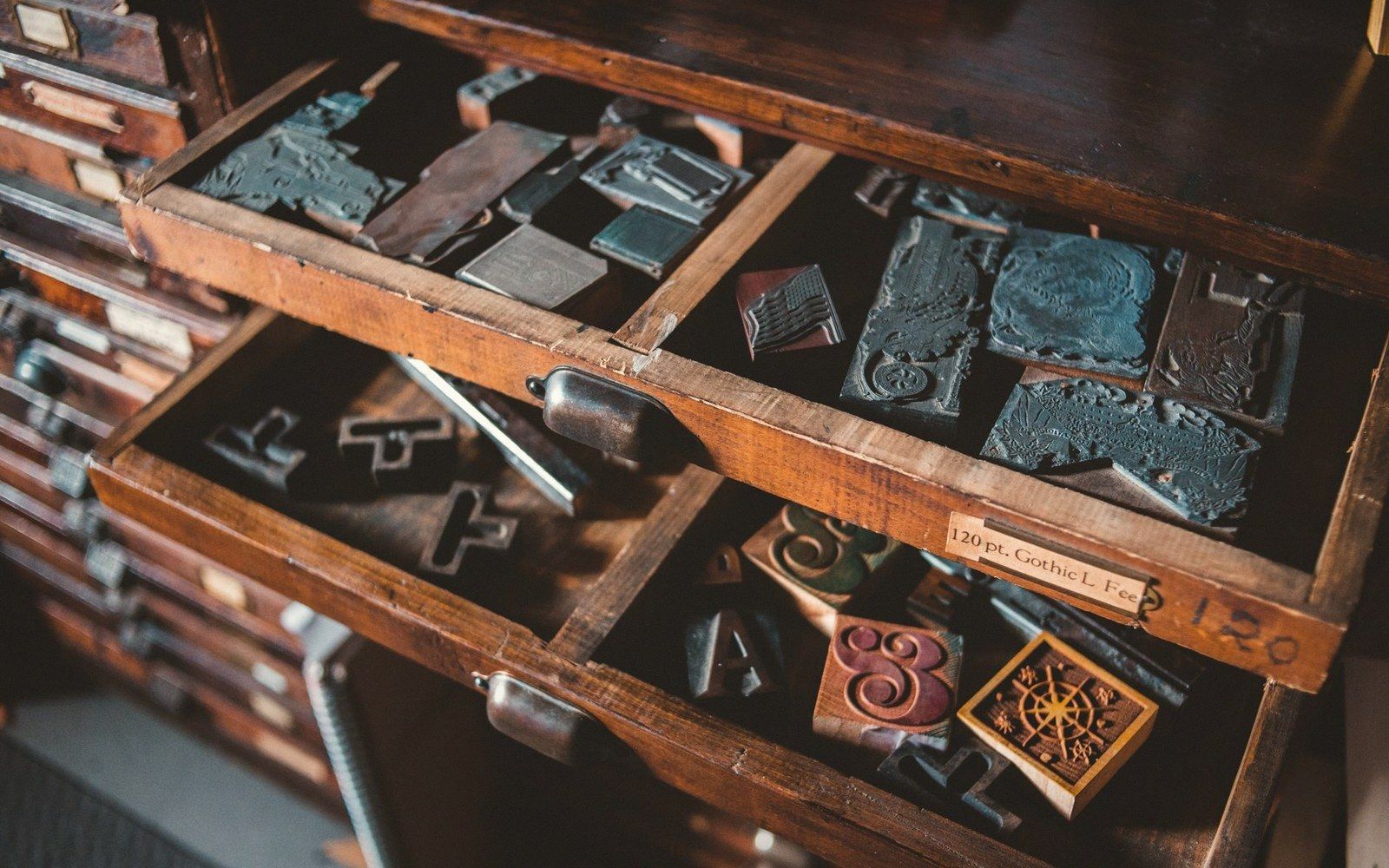 A page of hand-set type locked in the forme